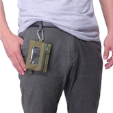 Mini torbica Traveler z obeskom